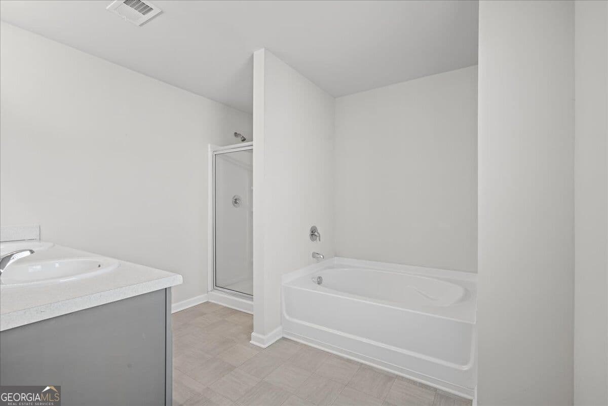 4 bedroom, 2.5 bathroom, 2,274 sq ft single family residence for sale at 613 Sturbridge Court, Mcdonough, GA 30253 — photo 7