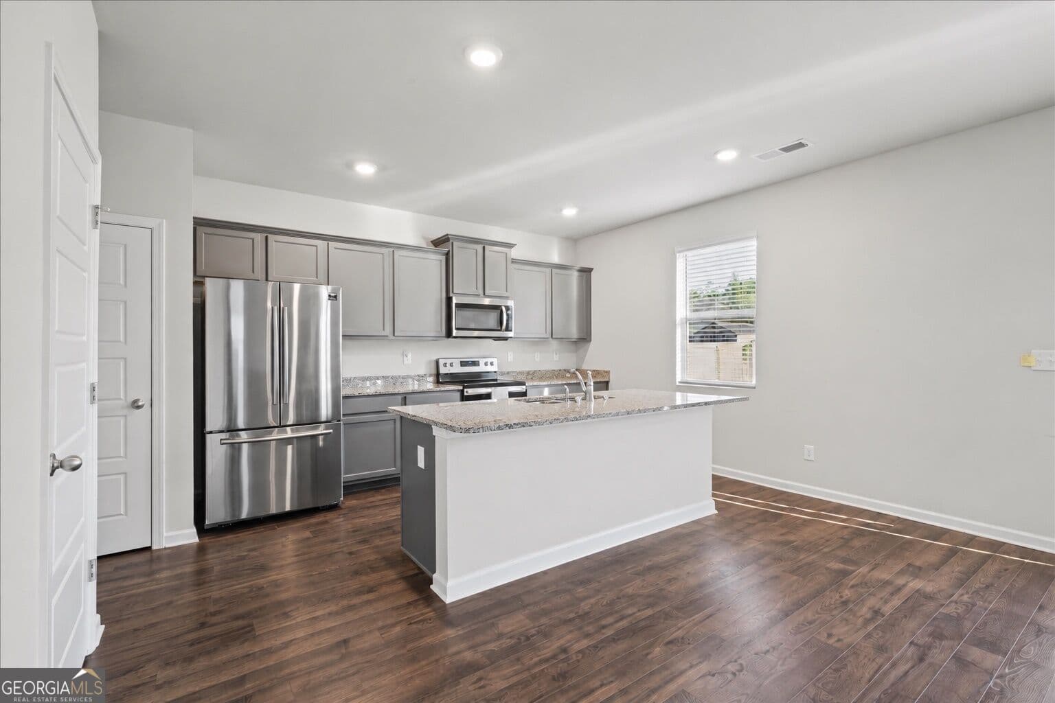 4 bedroom, 2.5 bathroom, 2,274 sq ft single family residence for sale at 613 Sturbridge Court, Mcdonough, GA 30253 — photo 4