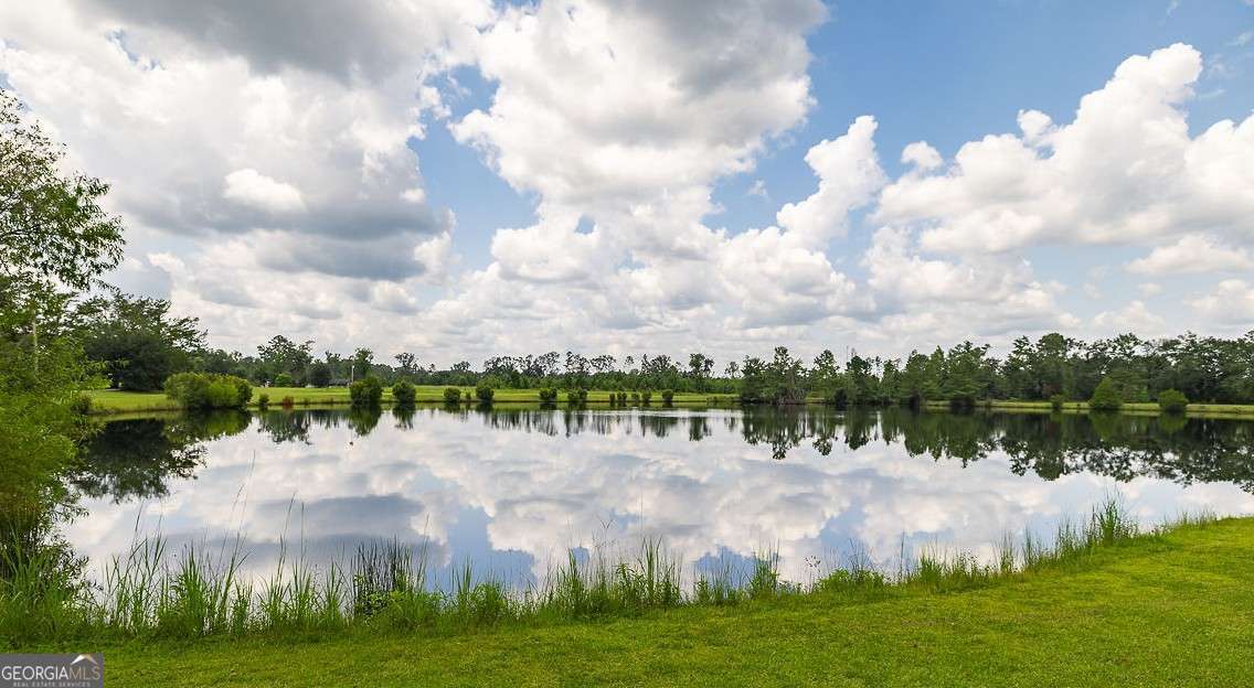 4 bedroom, 2 bathroom, 1,563 sq ft single family residence for sale at 410 Newton Road, Guyton, GA 31312 — photo 2