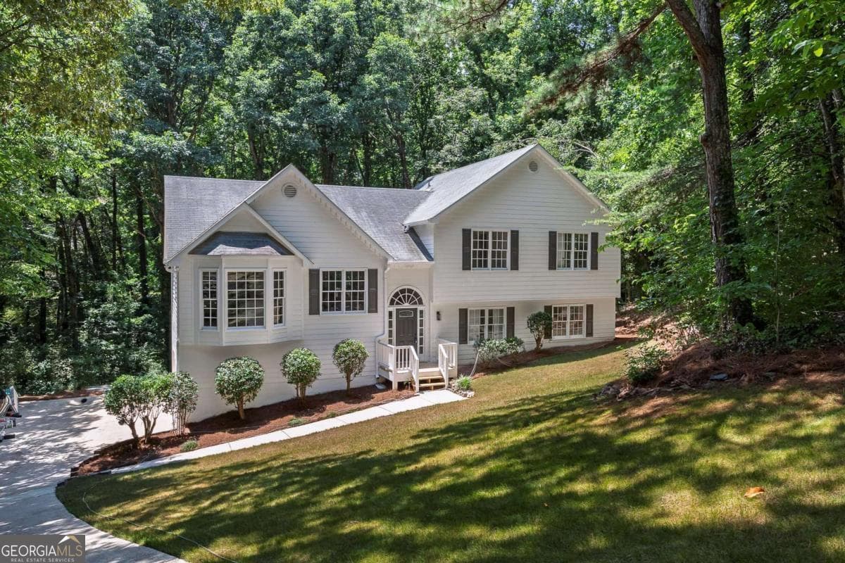4 bedroom, 3 bathroom, 3,590 sq ft single family residence sold at 132 Springwater Trace, Woodstock, GA 30188