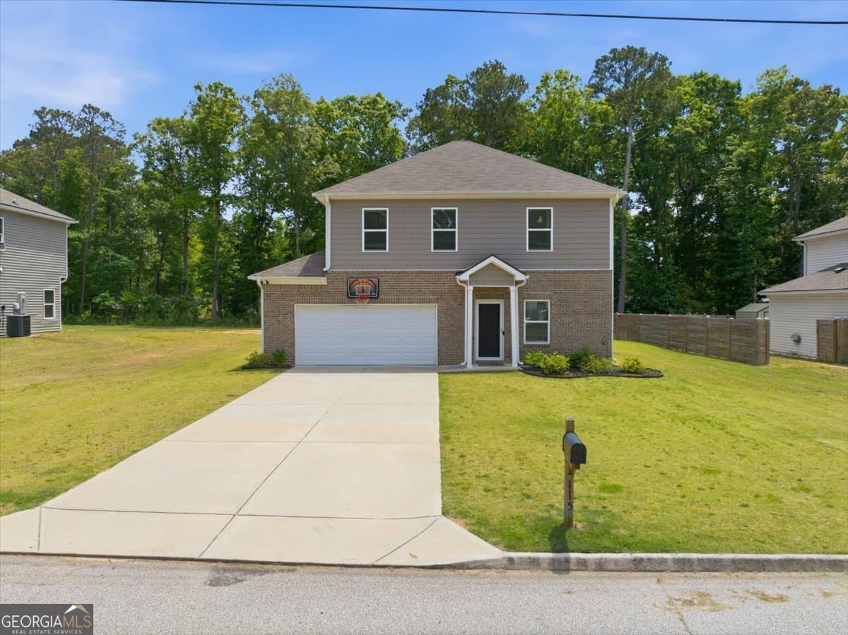 4 bedroom, 2.5 bathroom, 1,808 sq ft single family residence for sale at 115 Ison Woods Court, Griffin, GA 30224 — photo 2