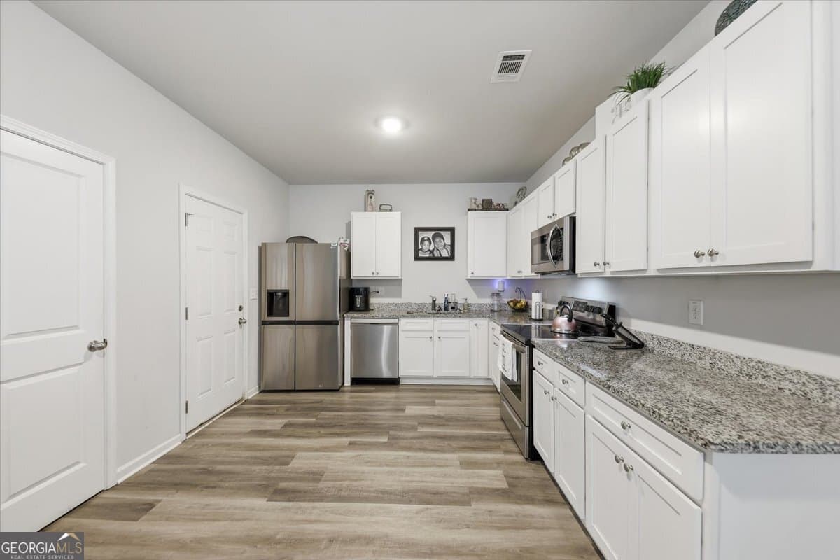 4 bedroom, 2.5 bathroom, 1,808 sq ft single family residence for sale at 115 Ison Woods Court, Griffin, GA 30224 — photo 7