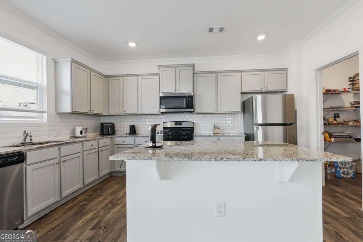 5 bedroom, 3 bathroom, 2,870 sq ft single family residence for sale at 642 Quail Pass, Dawsonville, GA 30534 — photo 6