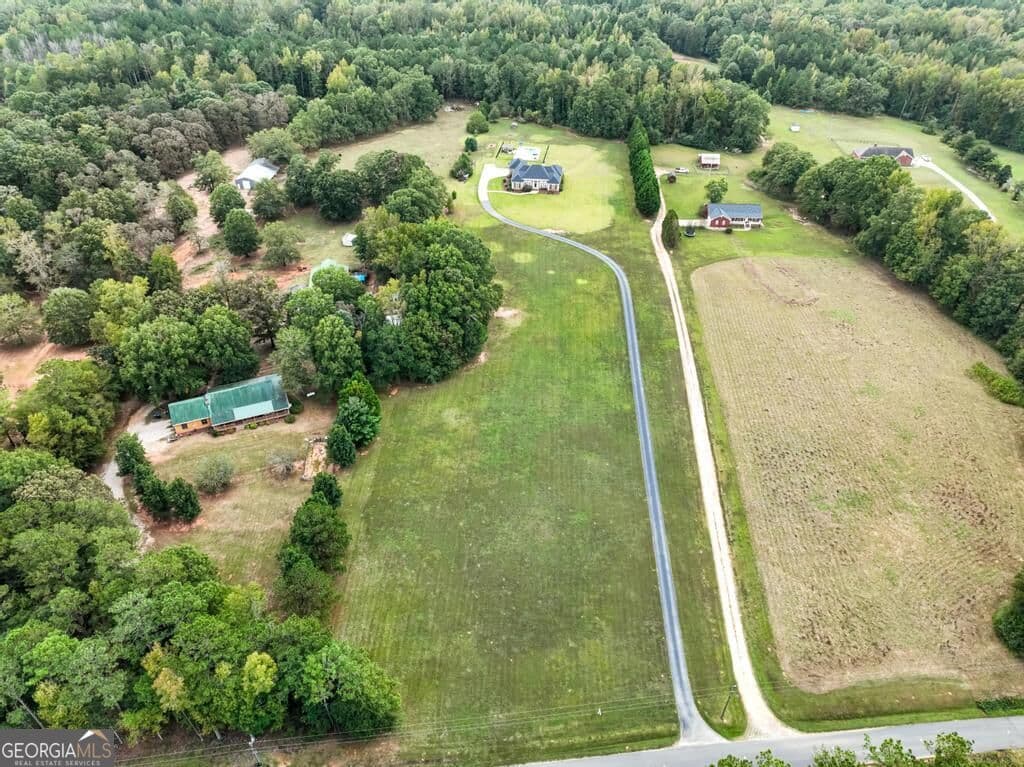 5 bedroom, 4.5 bathroom, 5,570 sq ft single family residence for sale at 760 Singley Drive, Locust Grove, GA 30248 — photo 2