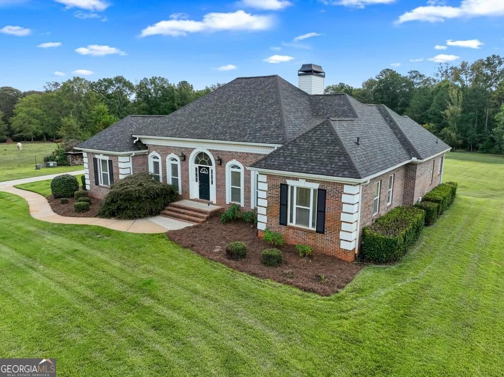 5 bedroom, 4.5 bathroom, 5,570 sq ft single family residence for sale at 760 Singley Drive, Locust Grove, GA 30248 — photo 6