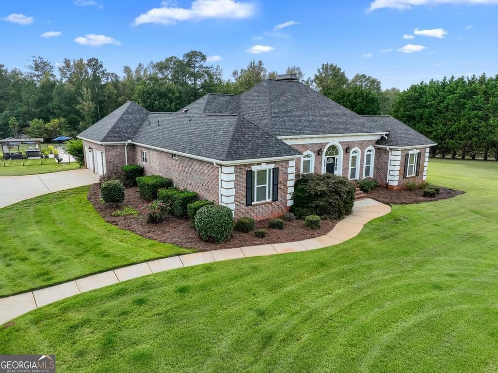 5 bedroom, 4.5 bathroom, 5,570 sq ft single family residence for sale at 760 Singley Drive, Locust Grove, GA 30248 — photo 3