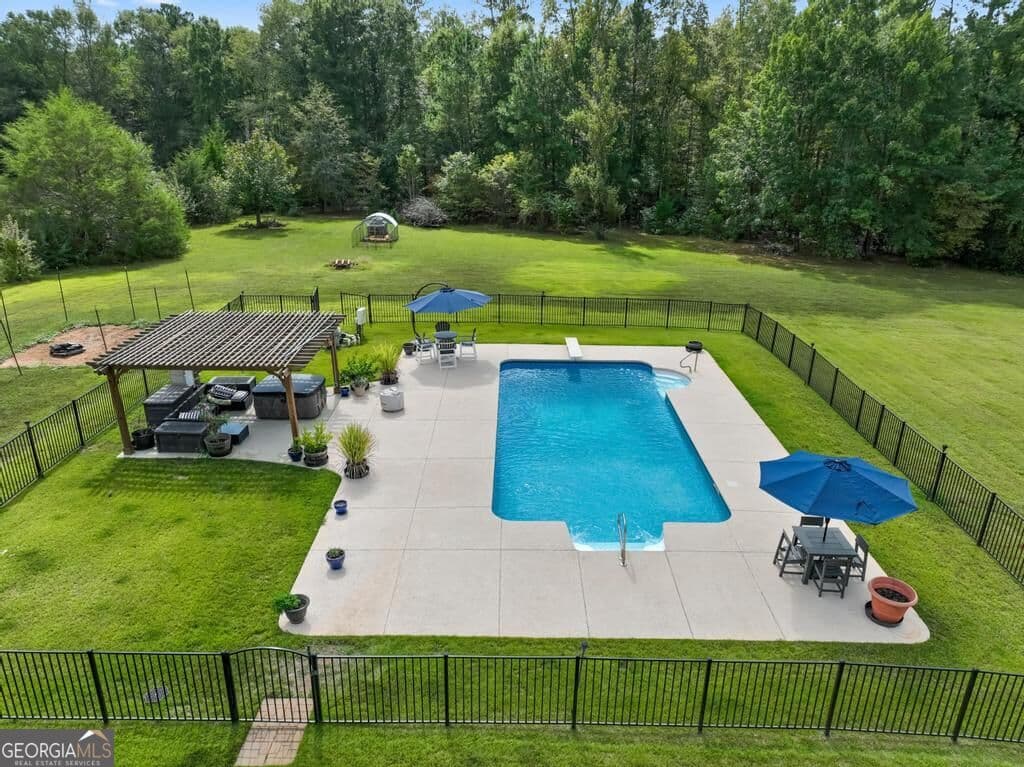 5 bedroom, 4.5 bathroom, 5,570 sq ft single family residence for sale at 760 Singley Drive, Locust Grove, GA 30248 — photo 5