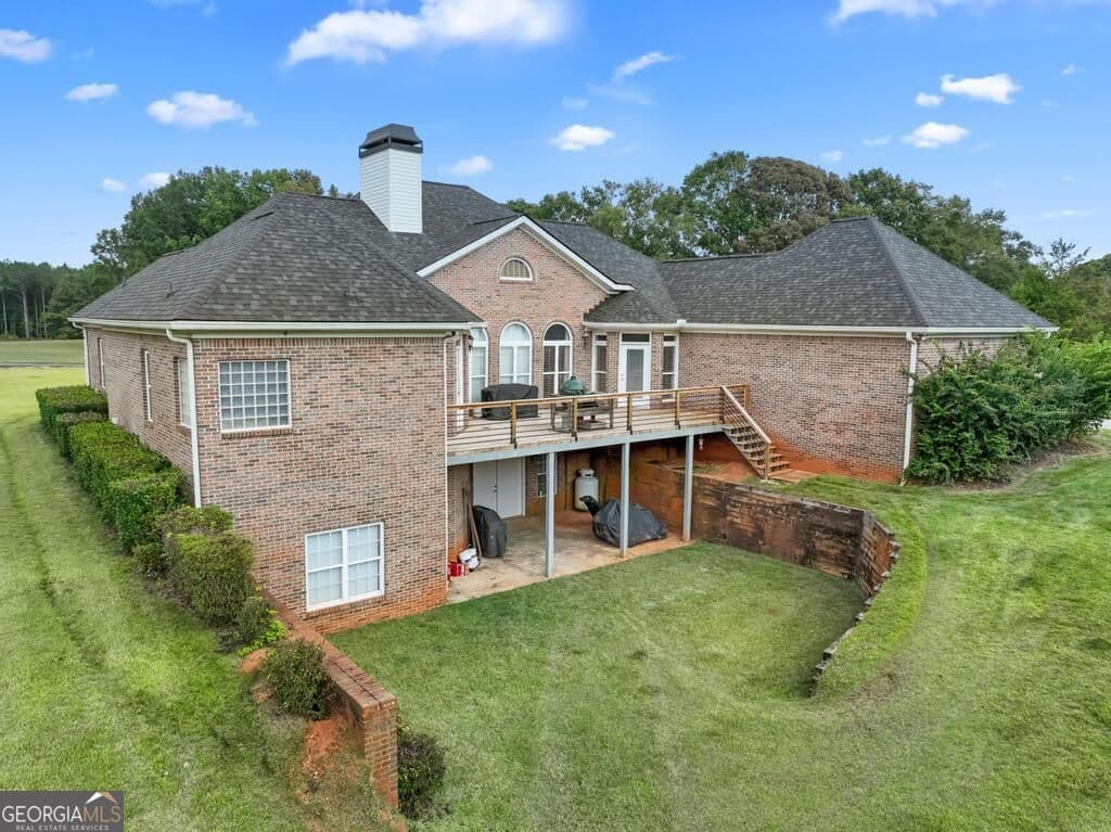 5 bedroom, 4.5 bathroom, 5,570 sq ft single family residence for sale at 760 Singley Drive, Locust Grove, GA 30248 — photo 4