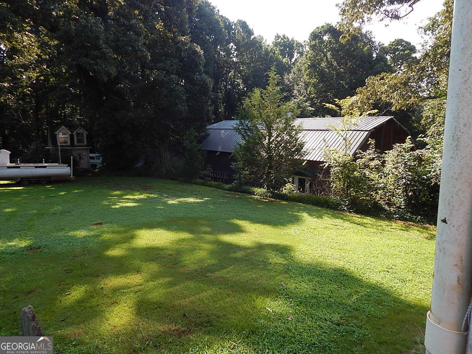 5 bedroom, 2 bathroom, 2,460 sq ft single family residence for sale at 6800 Old Macon Highway, Rex, GA 30273 — photo 6