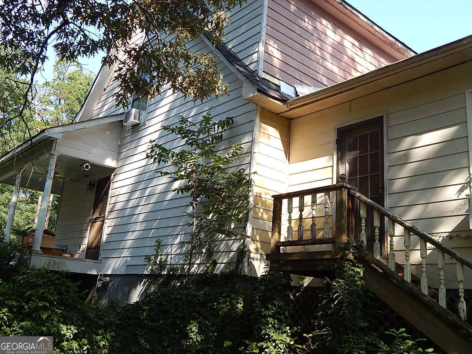 5 bedroom, 2 bathroom, 2,460 sq ft single family residence for sale at 6800 Old Macon Highway, Rex, GA 30273 — photo 9