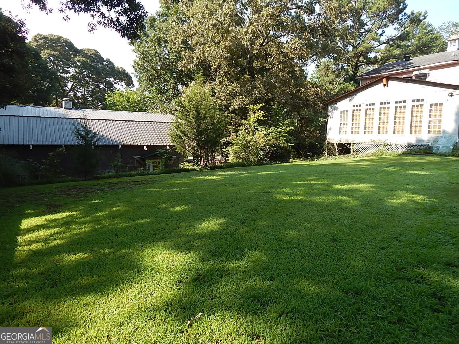 5 bedroom, 2 bathroom, 2,460 sq ft single family residence for sale at 6800 Old Macon Highway, Rex, GA 30273 — photo 8