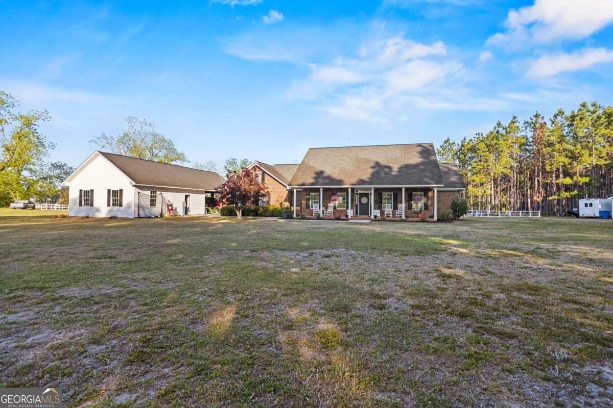 4 bedroom, 2.5 bathroom, 3,172 sq ft single family residence for sale at 2209 GA Hwy 86, Lyons, GA 30436 — photo 2