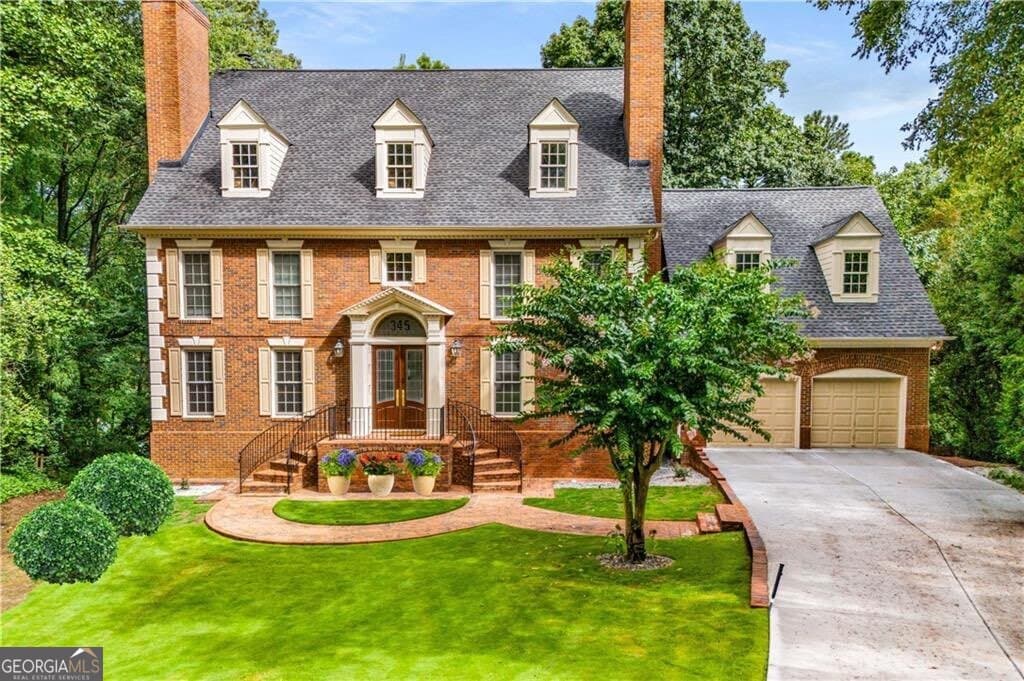 5 bedroom, 4.5 bathroom, 4,417 sq ft single family residence for sale at 345 W Berwicke Common, Sandy Springs, GA 30342 — photo 2