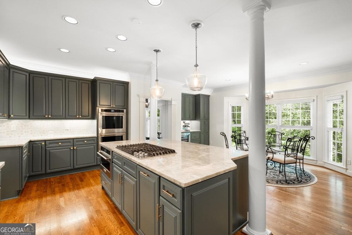 5 bedroom, 4.5 bathroom, 4,417 sq ft single family residence for sale at 345 W Berwicke Common, Sandy Springs, GA 30342 — photo 4