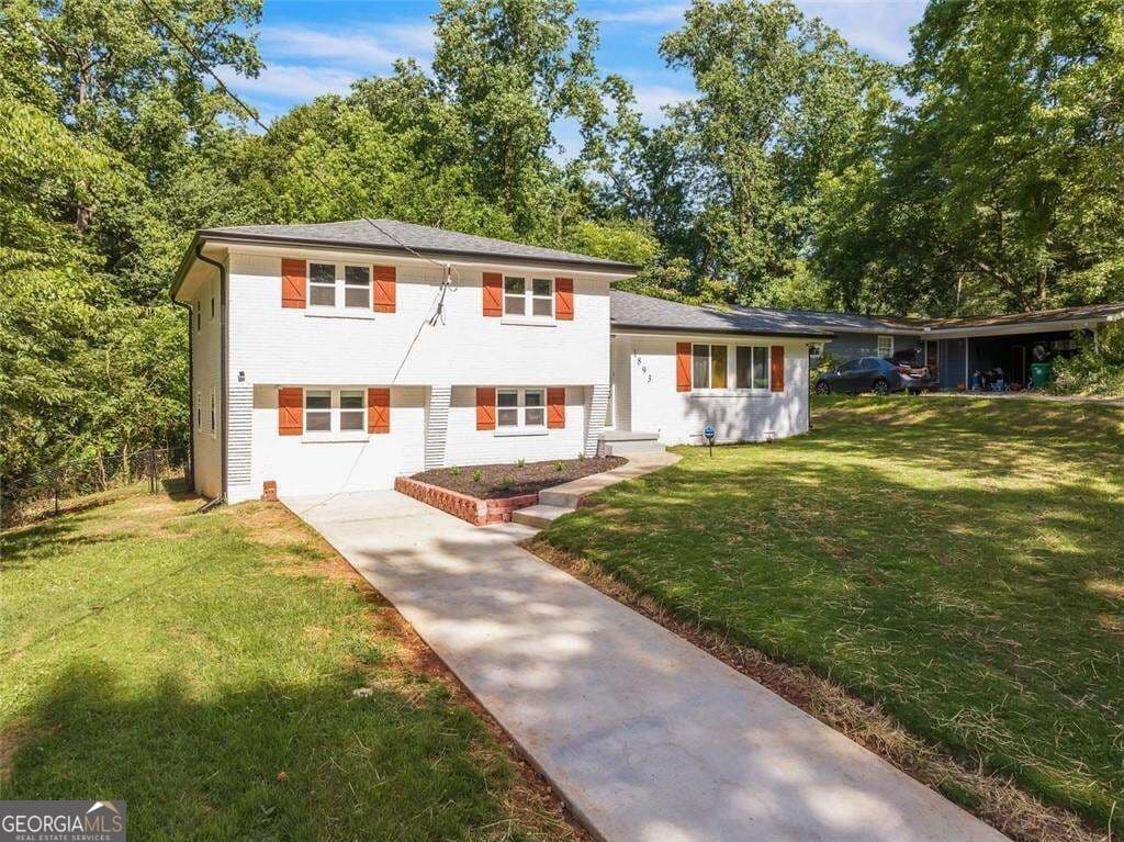 4 bedroom, 2 bathroom, 1,779 sq ft single family residence for sale at 1893 Burning Tree Drive, Decatur, GA 30032 — photo 2
