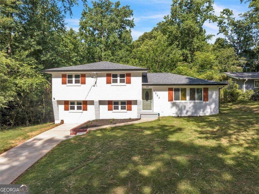 4 bedroom, 2 bathroom, 1,779 sq ft single family residence for sale at 1893 Burning Tree Drive, Decatur, GA 30032 — photo 1 of 24