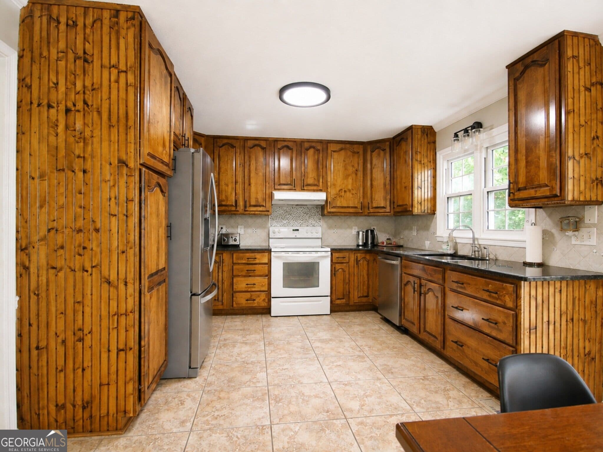 6 bedroom, 4 bathroom, 3,751 sq ft single family residence for sale at 4204 Newpond Trail, Kennesaw, GA 30144 — photo 10