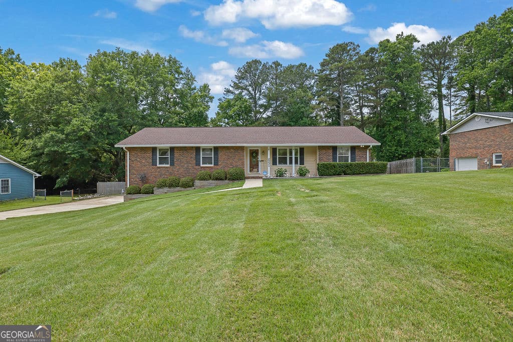 3 bedroom, 2 bathroom, 2,044 sq ft single family residence sold at 2231 Tourney Drive, Marietta, GA 30062