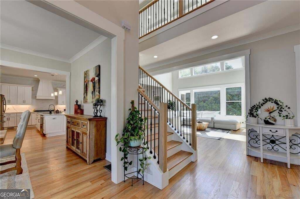 7 bedroom, 5.5 bathroom, 5,827 sq ft single family residence for sale at 4135 Wildberry Lane, Cumming, GA 30040 — photo 2