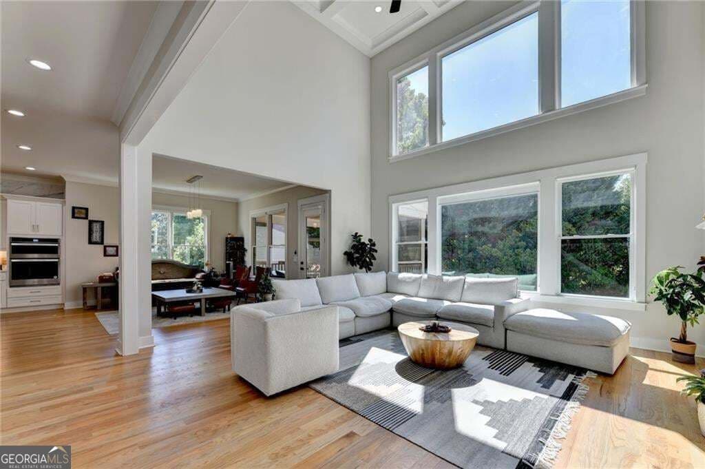 7 bedroom, 5.5 bathroom, 5,827 sq ft single family residence for sale at 4135 Wildberry Lane, Cumming, GA 30040 — photo 7