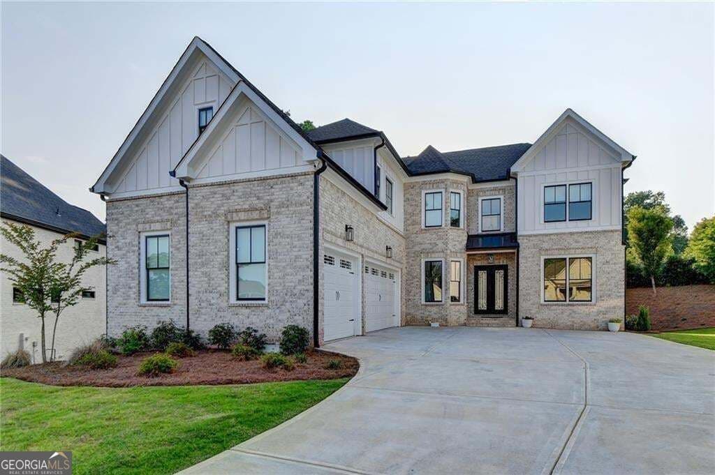 7 bedroom, 5.5 bathroom, 5,827 sq ft single family residence for sale at 4135 Wildberry Lane, Cumming, GA 30040 — photo 1 of 65