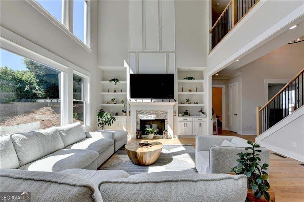 7 bedroom, 5.5 bathroom, 5,827 sq ft single family residence for sale at 4135 Wildberry Lane, Cumming, GA 30040 — photo 9