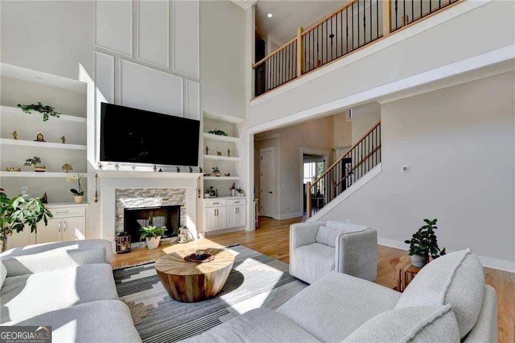7 bedroom, 5.5 bathroom, 5,827 sq ft single family residence for sale at 4135 Wildberry Lane, Cumming, GA 30040 — photo 10