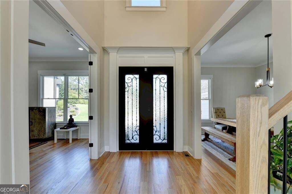 7 bedroom, 5.5 bathroom, 5,827 sq ft single family residence for sale at 4135 Wildberry Lane, Cumming, GA 30040 — photo 4