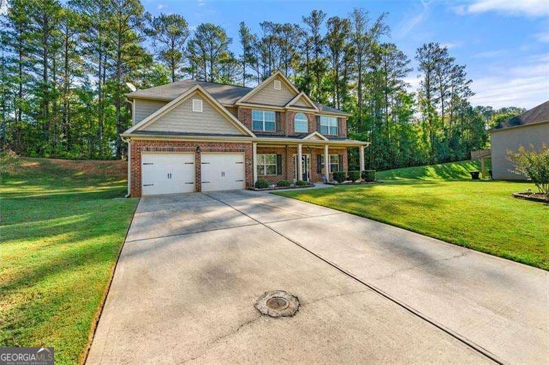 5 bedroom, 3 bathroom, 2,923 sq ft single family residence for sale at 2503 Ginger Leaf Drive, Conyers, GA 30013 — photo 2