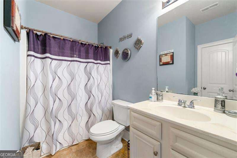 5 bedroom, 3 bathroom, 2,923 sq ft single family residence for sale at 2503 Ginger Leaf Drive, Conyers, GA 30013 — photo 8