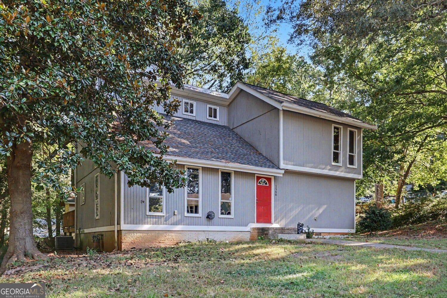 4 bedroom, 2 bathroom, 1,925 sq ft single family residence for sale at 1566 Village Drive, Norcross, GA 30093 — photo 7