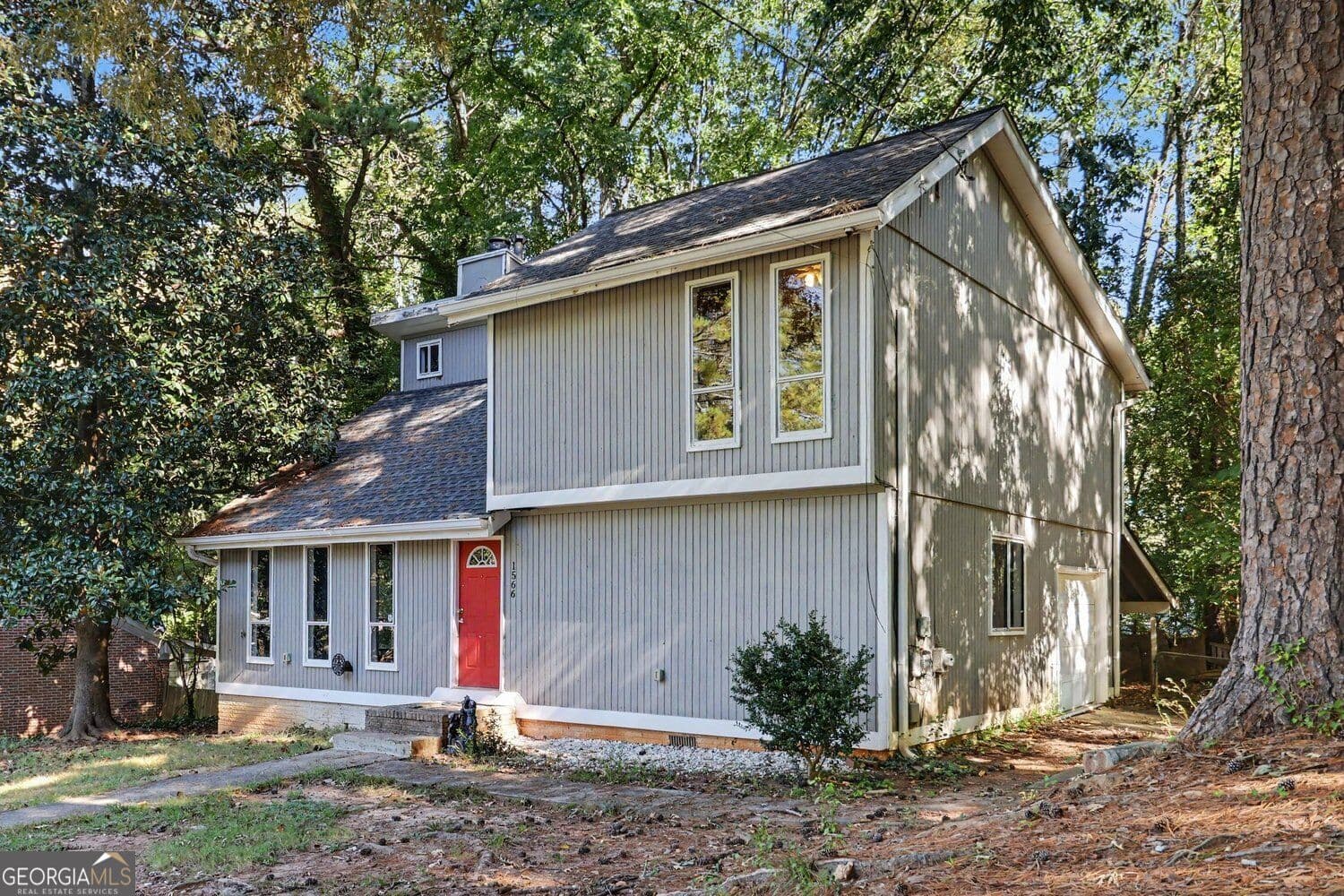 4 bedroom, 2 bathroom, 1,925 sq ft single family residence for sale at 1566 Village Drive, Norcross, GA 30093 — photo 8