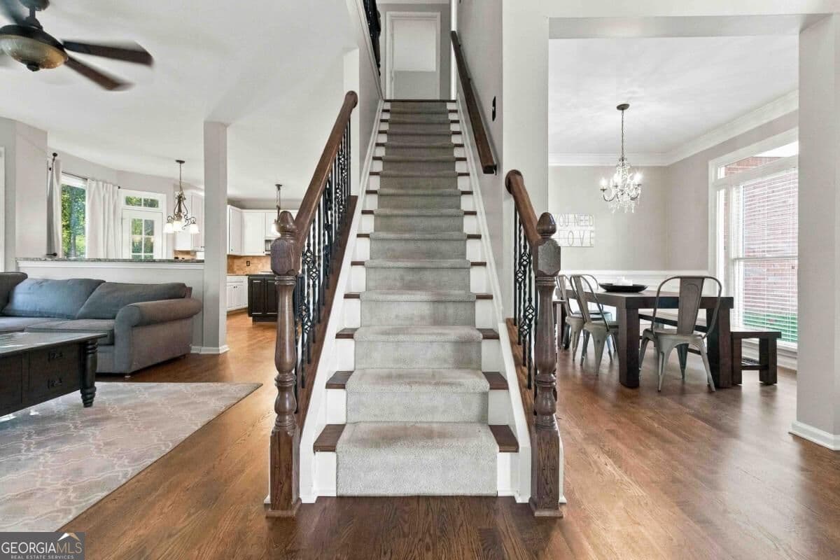 4 bedroom, 3.5 bathroom, 3,410 sq ft single family residence for sale at 5880 The Twelfth Fairway, Suwanee, GA 30024 — photo 2