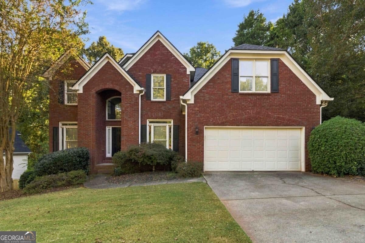 4 bedroom, 3.5 bathroom, 3,410 sq ft single family residence for sale at 5880 The Twelfth Fairway, Suwanee, GA 30024
