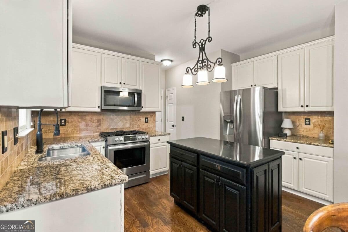 4 bedroom, 3.5 bathroom, 3,410 sq ft single family residence for sale at 5880 The Twelfth Fairway, Suwanee, GA 30024 — photo 10