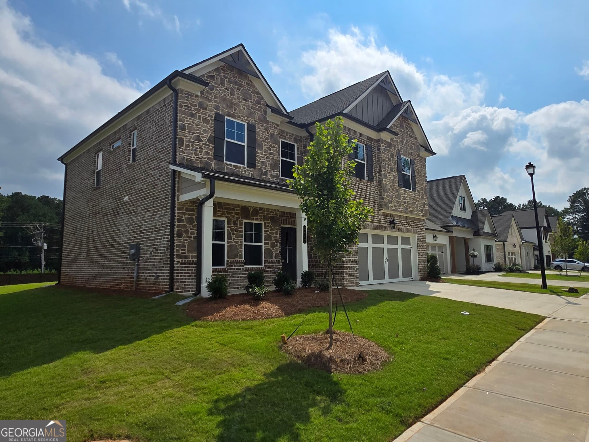4 bedroom, 3 bathroom, 2,549 sq ft single family residence for sale at 2447 Enchanted Sky Way, Dacula, GA 30019 — photo 3