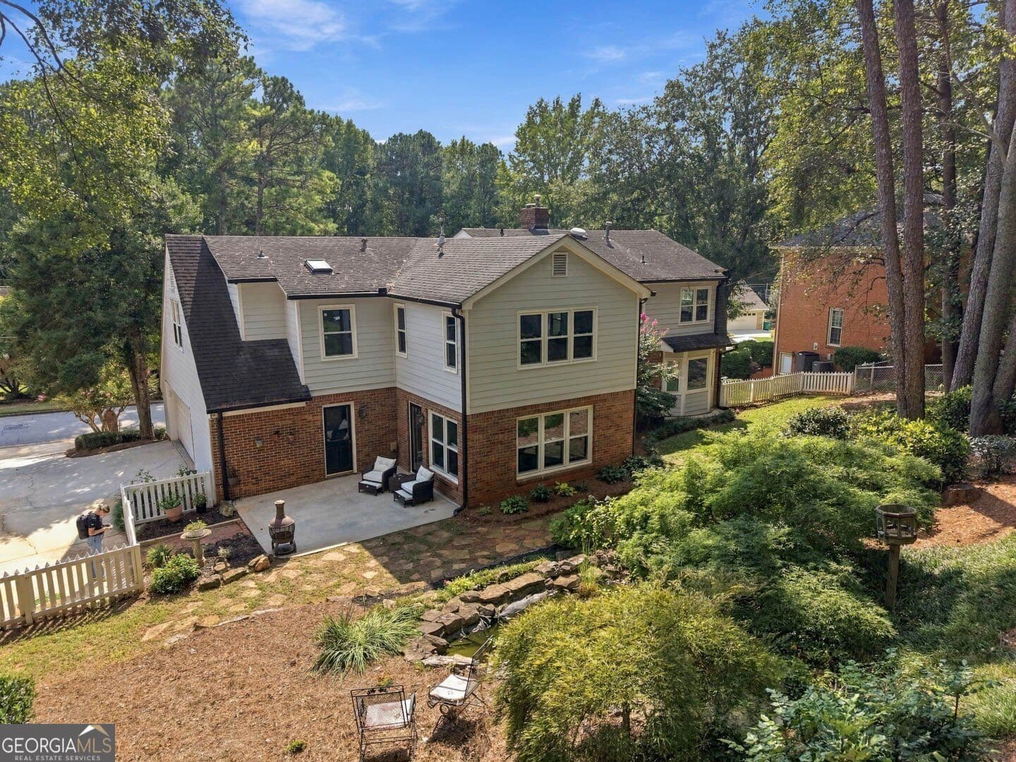 5 bedroom, 3.5 bathroom, 4,241 sq ft single family residence for sale at 2819 Livsey Drive, Tucker, GA 30084 — photo 2