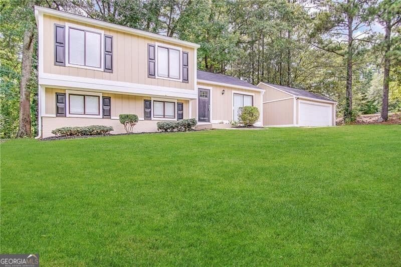 3 bedroom, 2 bathroom, 1,668 sq ft single family residence for sale at 4887 Martins Crossing Road, Stone Mountain, GA 30088