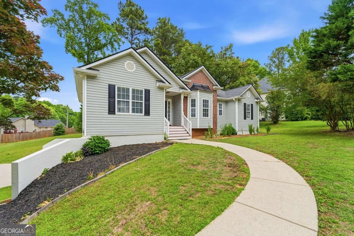 4 bedroom, 3 bathroom, 1,603 sq ft single family residence for sale at 4036 Saint George Walk, Powder Springs, GA 30127 — photo 1 of 33