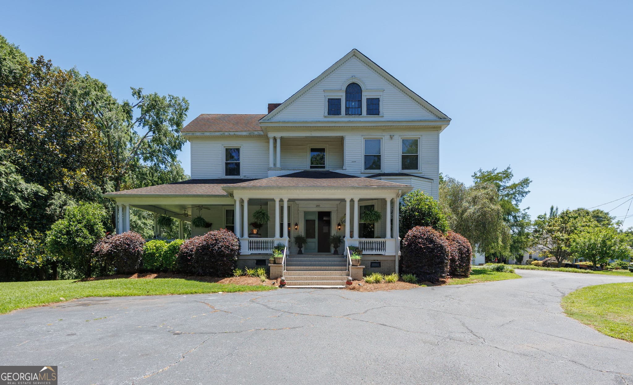 5 bedroom, 3 bathroom, 4,060 sq ft single family residence for sale at 200 W Main Street, Forsyth, GA 31029 — photo 2