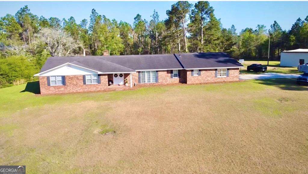 4 bedroom, 3 bathroom, 3,710 sq ft single family residence for sale at 1881 Bell Telephone Road, Hazlehurst, GA 31539 — photo 2