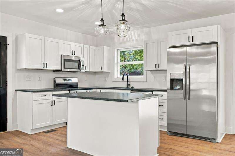 3 bedroom, 1.5 bathroom, 1,152 sq ft single family residence for sale at 250 E Girard Avenue, Cedartown, GA 30125 — photo 4