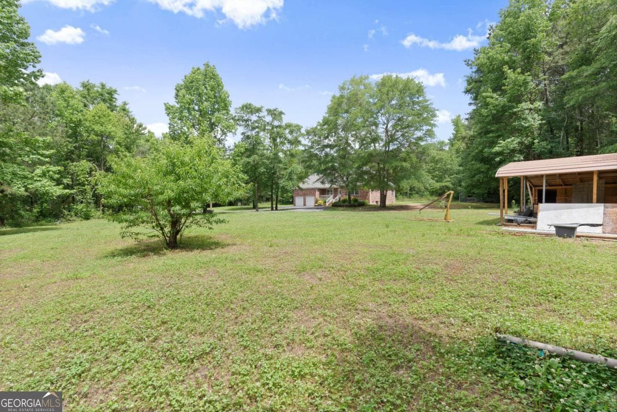 5 bedroom, 3 bathroom, 2,174 sq ft single family residence for sale at 577 Everett Springs Road, Calhoun, GA 30701 — photo 4