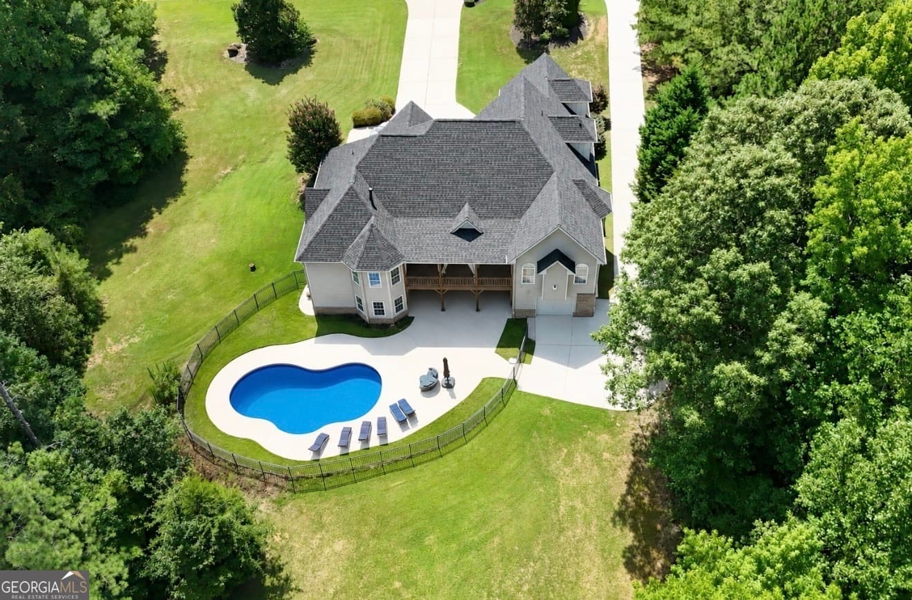 4 bedroom, 3.5 bathroom, 3,514 sq ft single family residence for sale at 32 River Rapids Drive, Forsyth, GA 31029 — photo 6