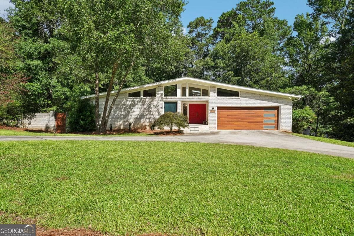 5 bedroom, 4 bathroom, 4,741 sq ft single family residence sold at 2018 Glacier Drive, Stone Mountain, GA 30087