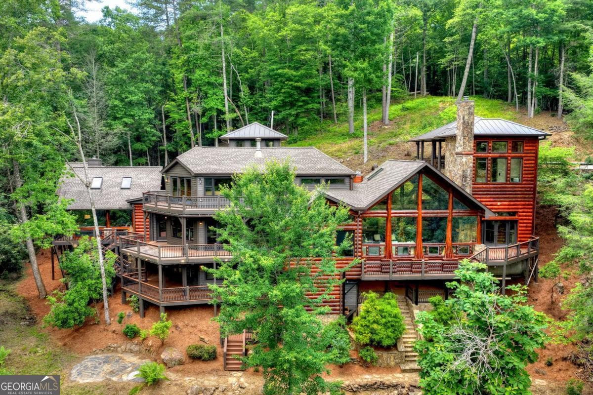 5 bedroom, 6 bathroom, 8,142 sq ft cabin,single family residence for sale at 192 Delphi Hills Lane, Mccaysville, GA 30555 — photo 1 of 100