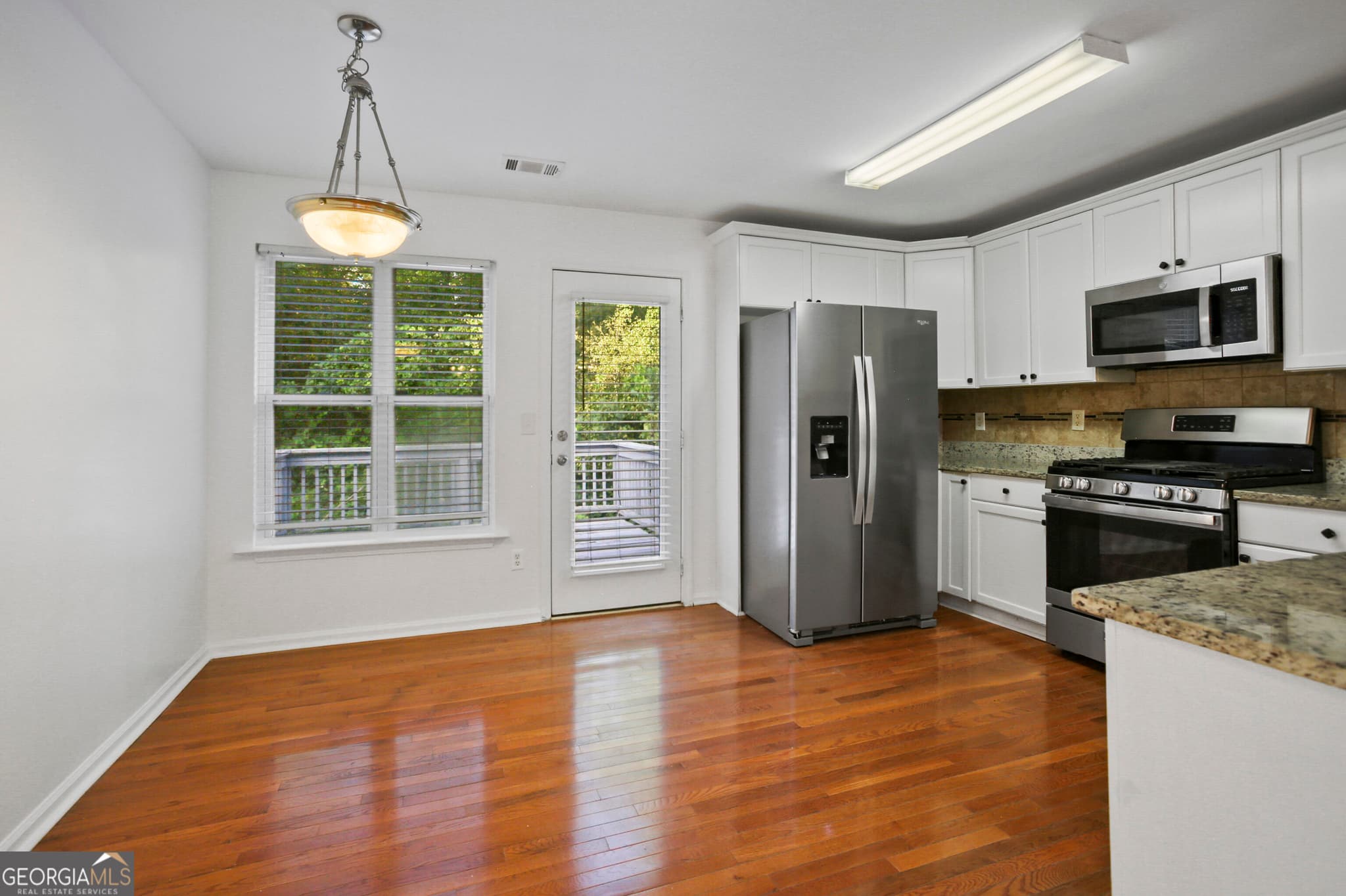 5 bedroom, 3 bathroom single family residence for sale at 1068 S Gordon Road, Austell, GA 30168 — photo 6