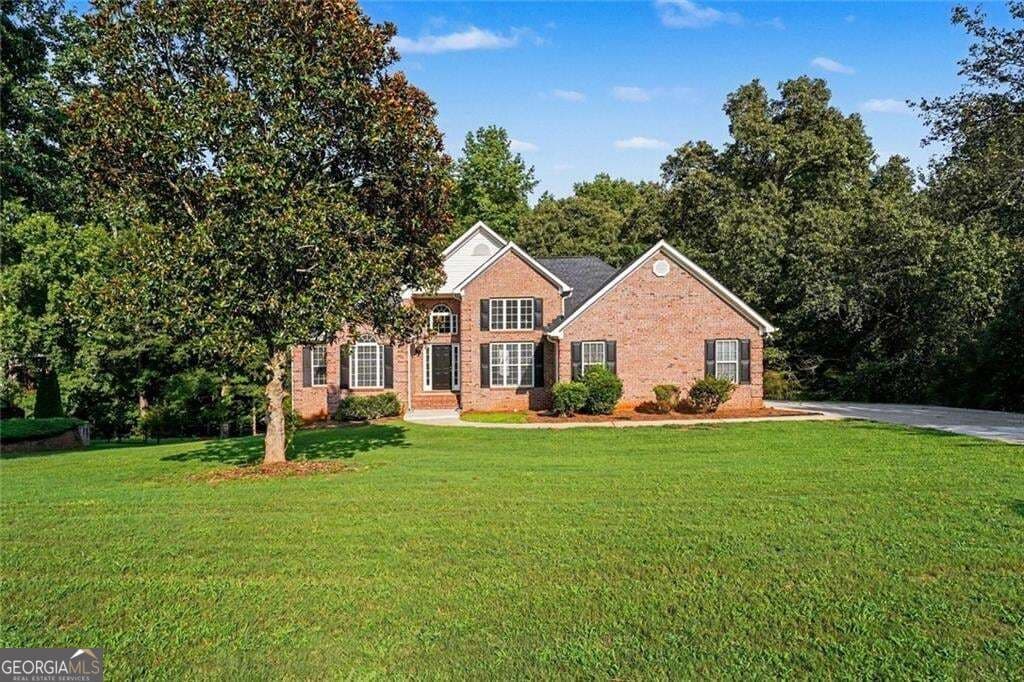 4 bedroom, 3 bathroom, 5,142 sq ft single family residence for sale at 630 Brookgreen Place, Mcdonough, GA 30252 — photo 2