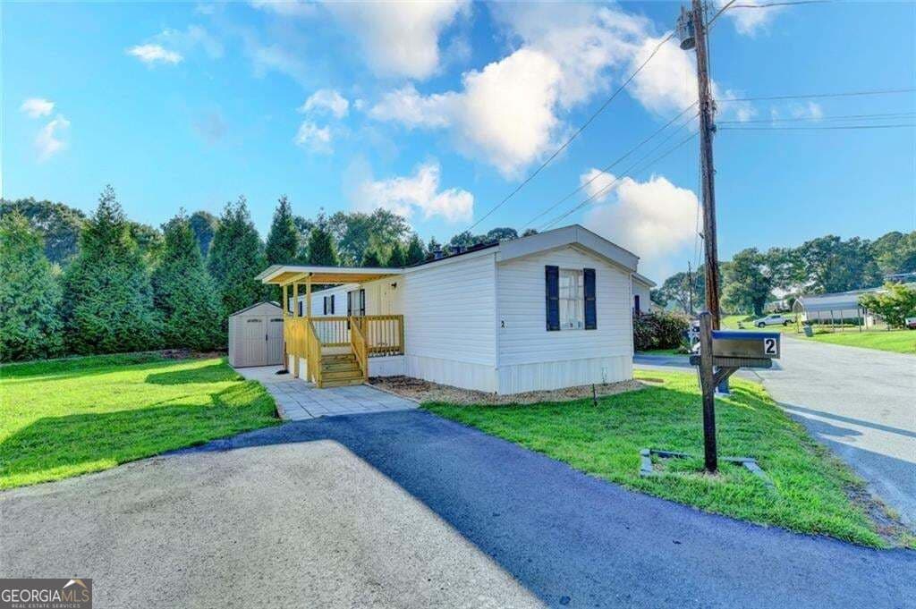 2 bedroom, 2 bathroom, 1,008 sq ft manufactured home,single family residence for sale at 3000 Clarks Bridge Road, Gainesville, GA 30501 — photo 2