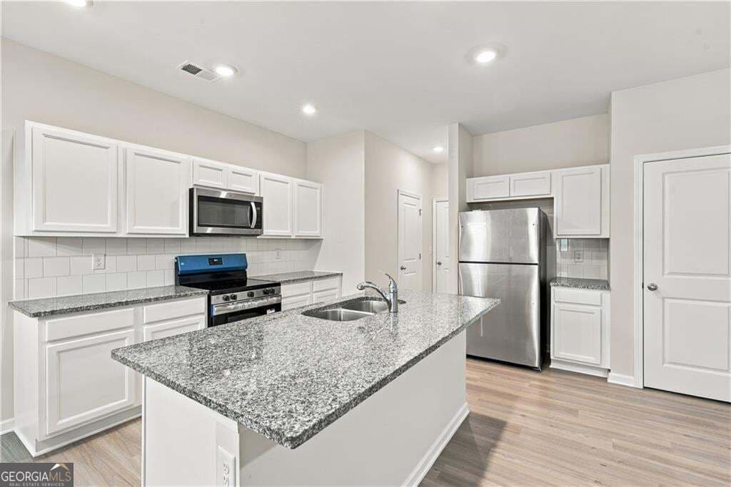 3 bedroom, 2.5 bathroom, 1,772 sq ft townhouse for sale at 1491 Ben Park Way, Grayson, GA 30017 — photo 10